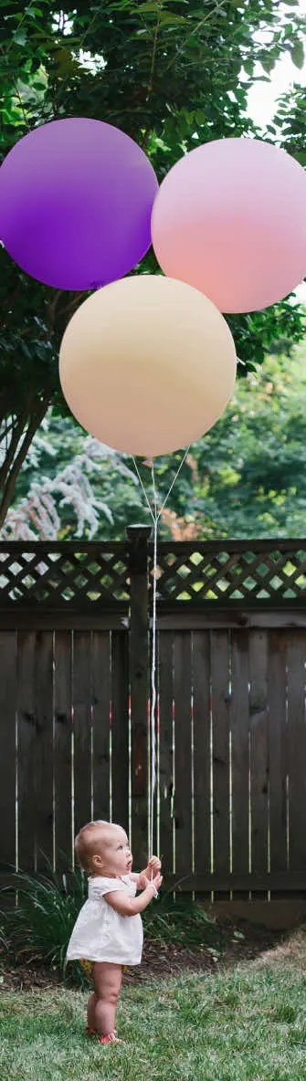 The baby with baloons